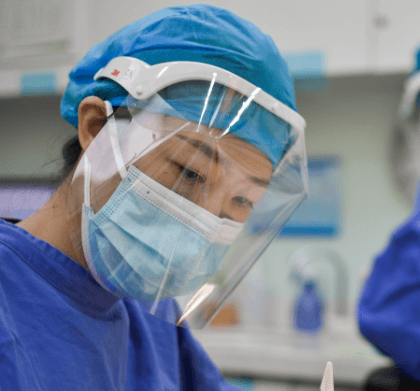 Worker wearing PPE face coverings